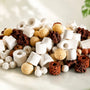 Pile of mixed aquarium bio balls filter media including porous ceramic rings, mineral cubes, lava rock, and bio spheres for nitrifying bacteria.