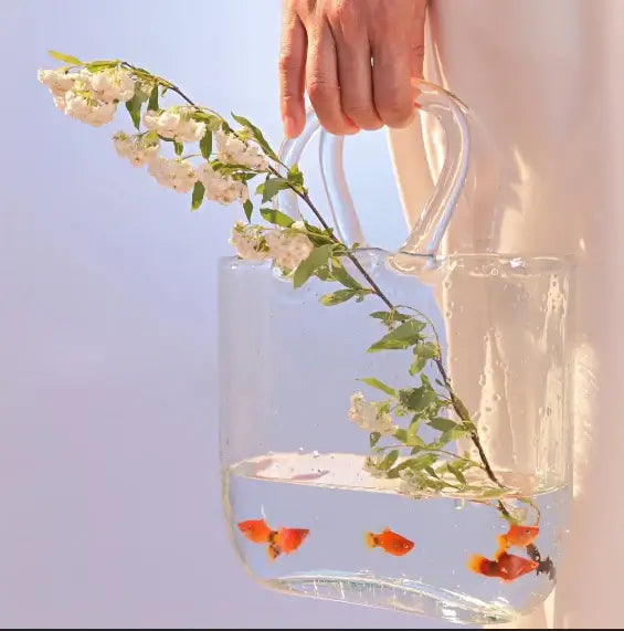 Close-up of Handbag Fish Tank showing handle and body detail of the portable aquarium