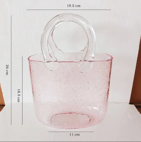Handbag Fish Tank shown with betta fish inside as a creative desktop nano aquarium